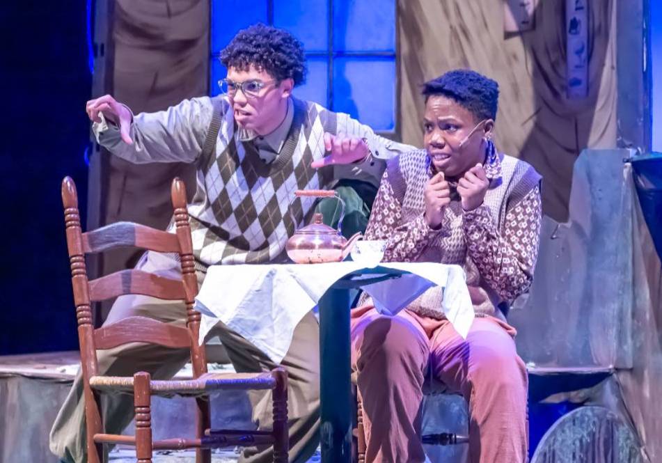 Student actors on stage performing A Year With Frog and Toad play. 