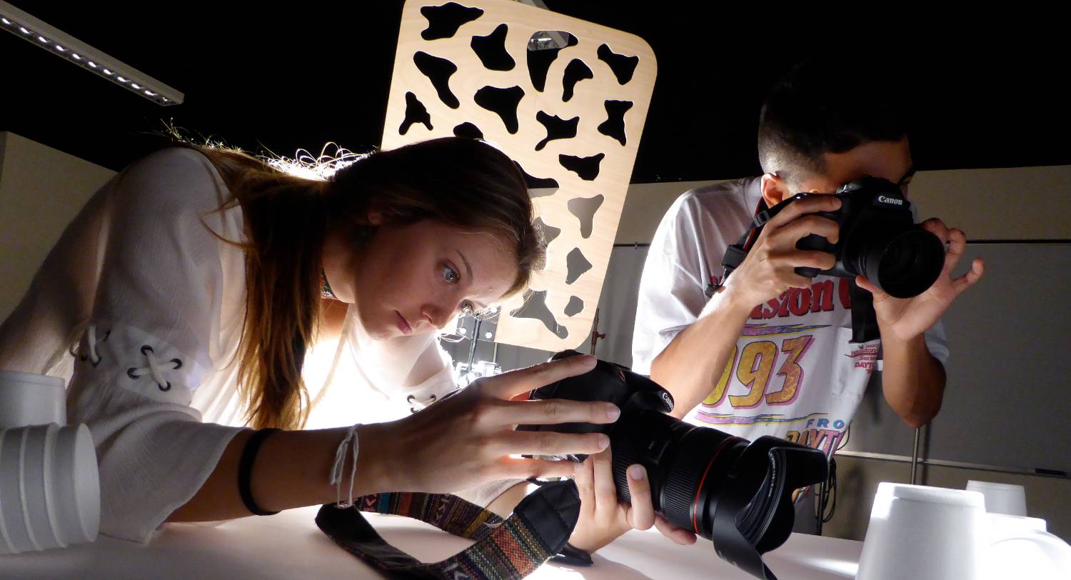 two students in lighting studio