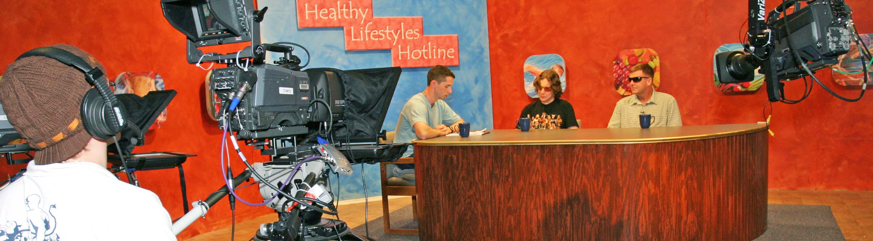 Students assisting in a live broadcast production.