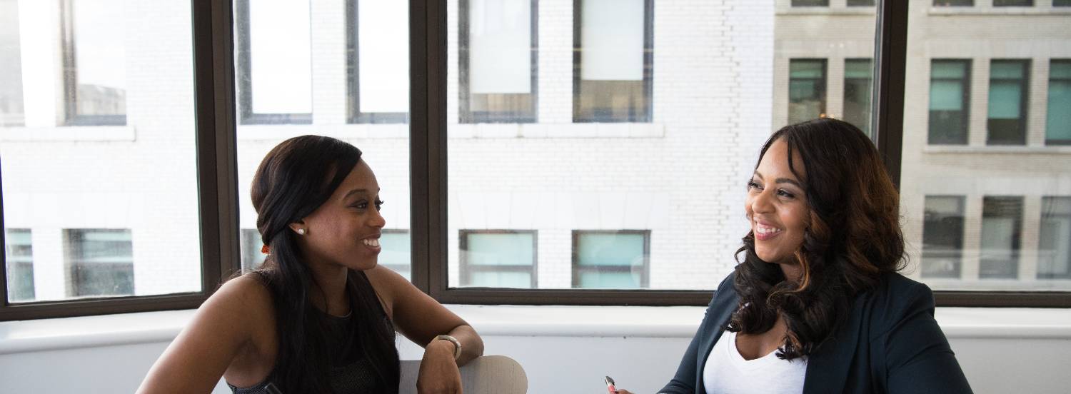 two business people in a meeting