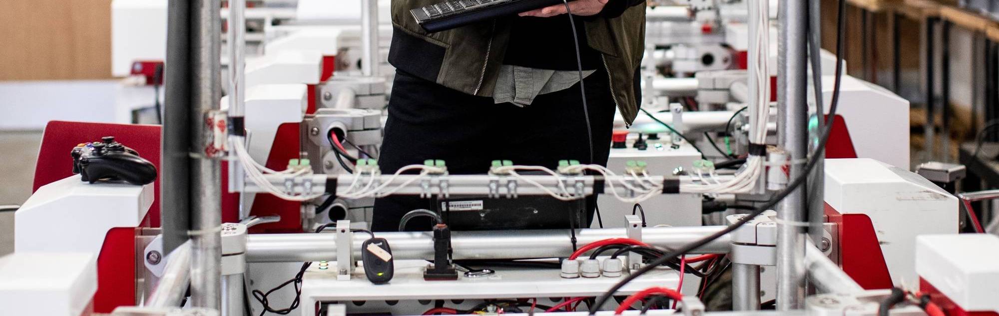 Engineer working on a computer-aided machine.