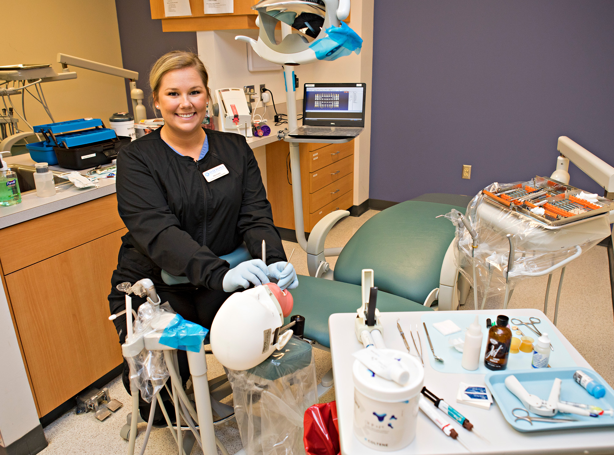 student working in dental program