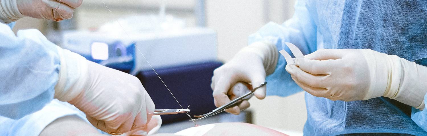 patient getting stitches