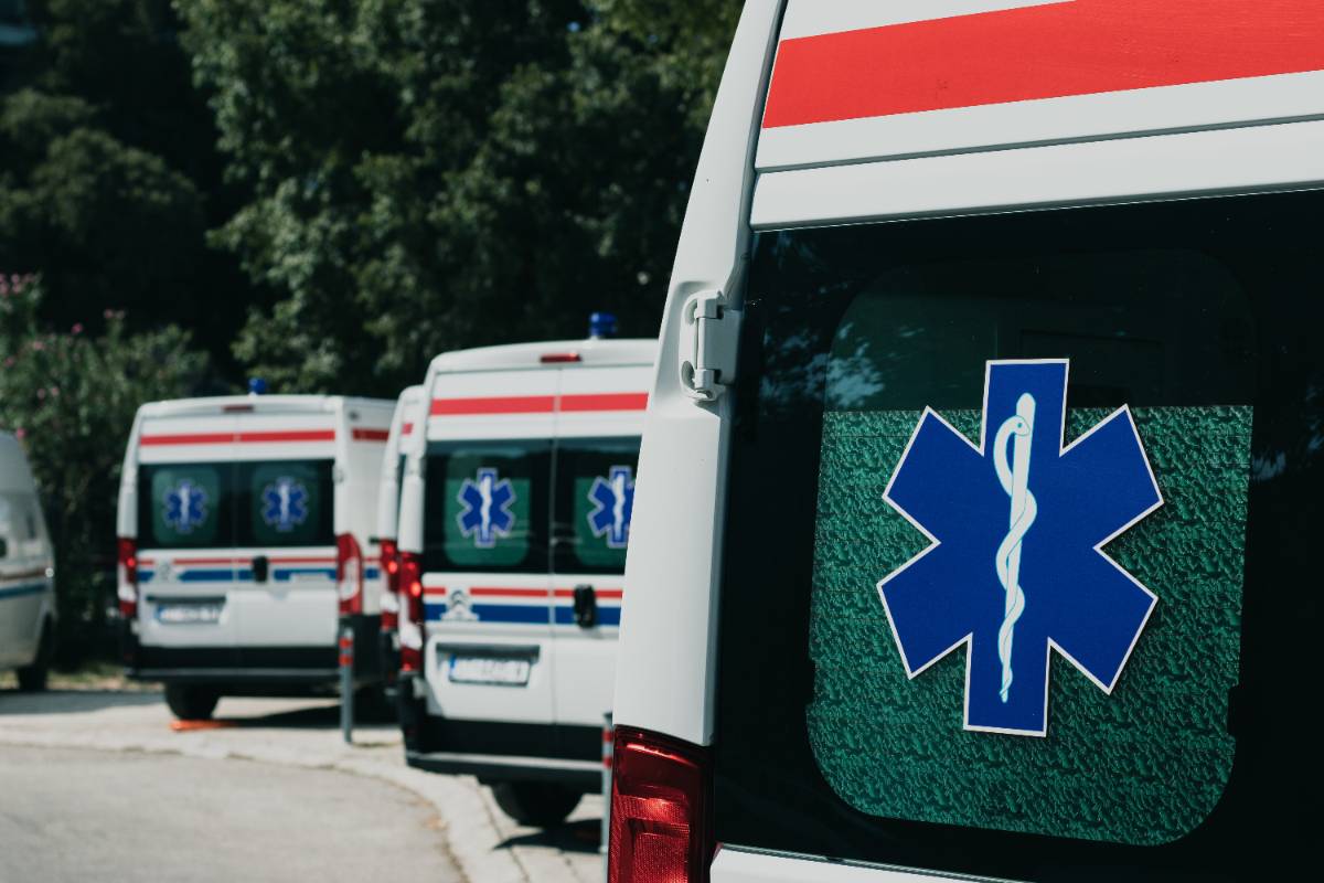 three parked ambulances