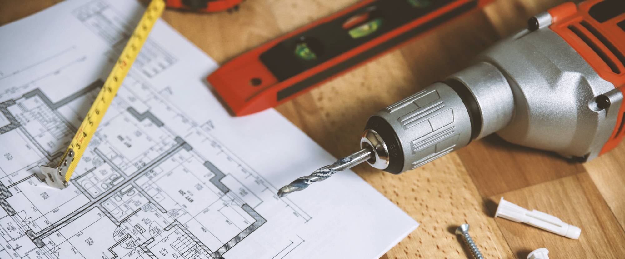 tools on a table and a floorplan