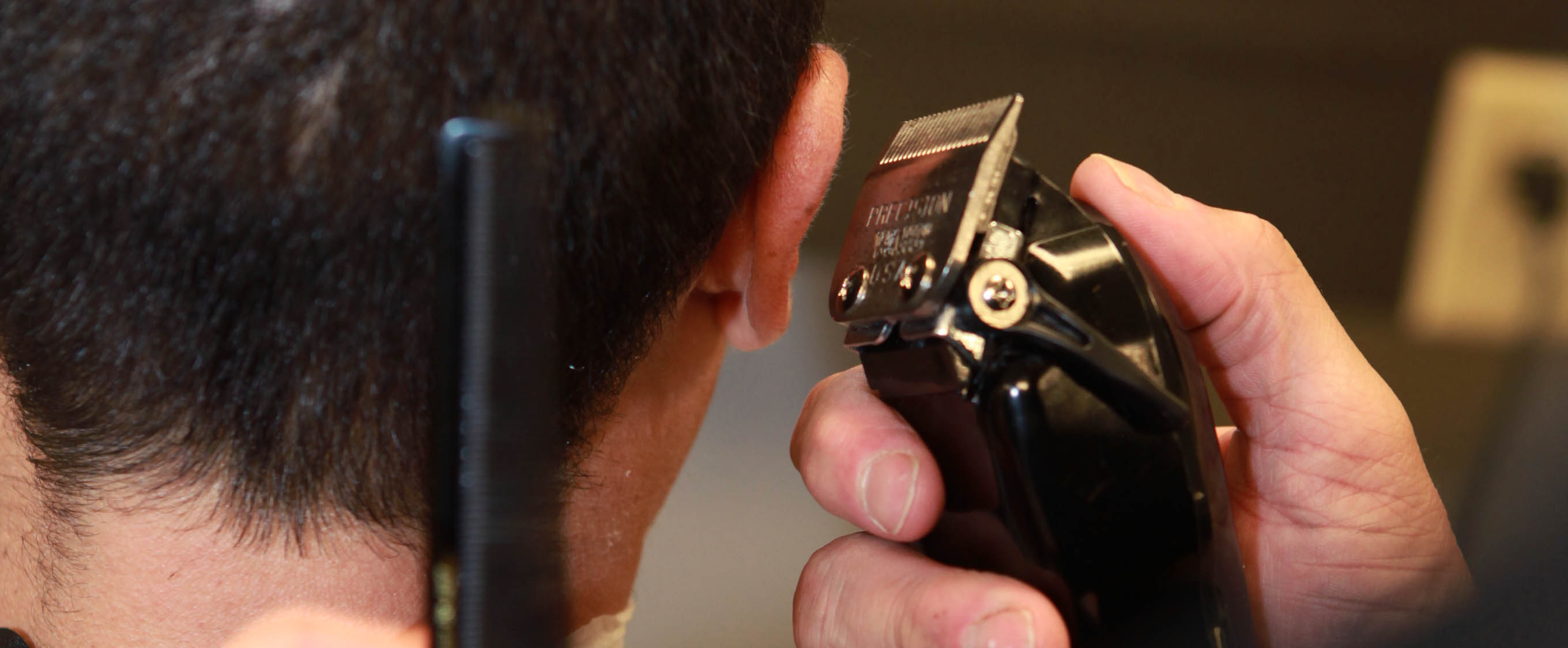 Student clipping hair