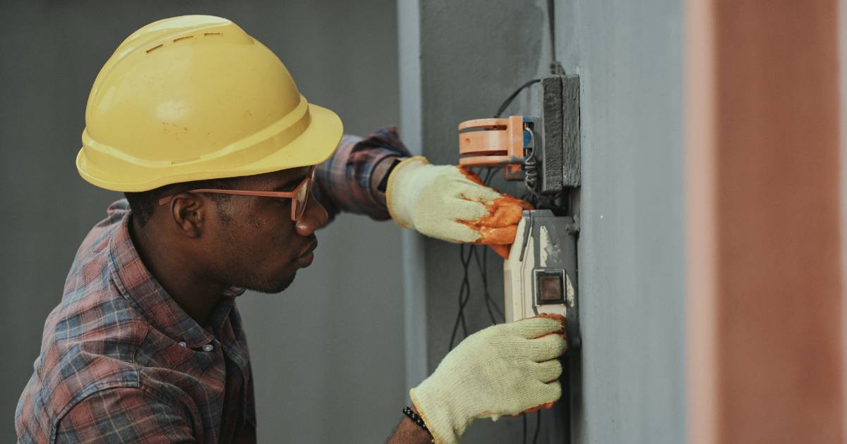 electrician working on panel