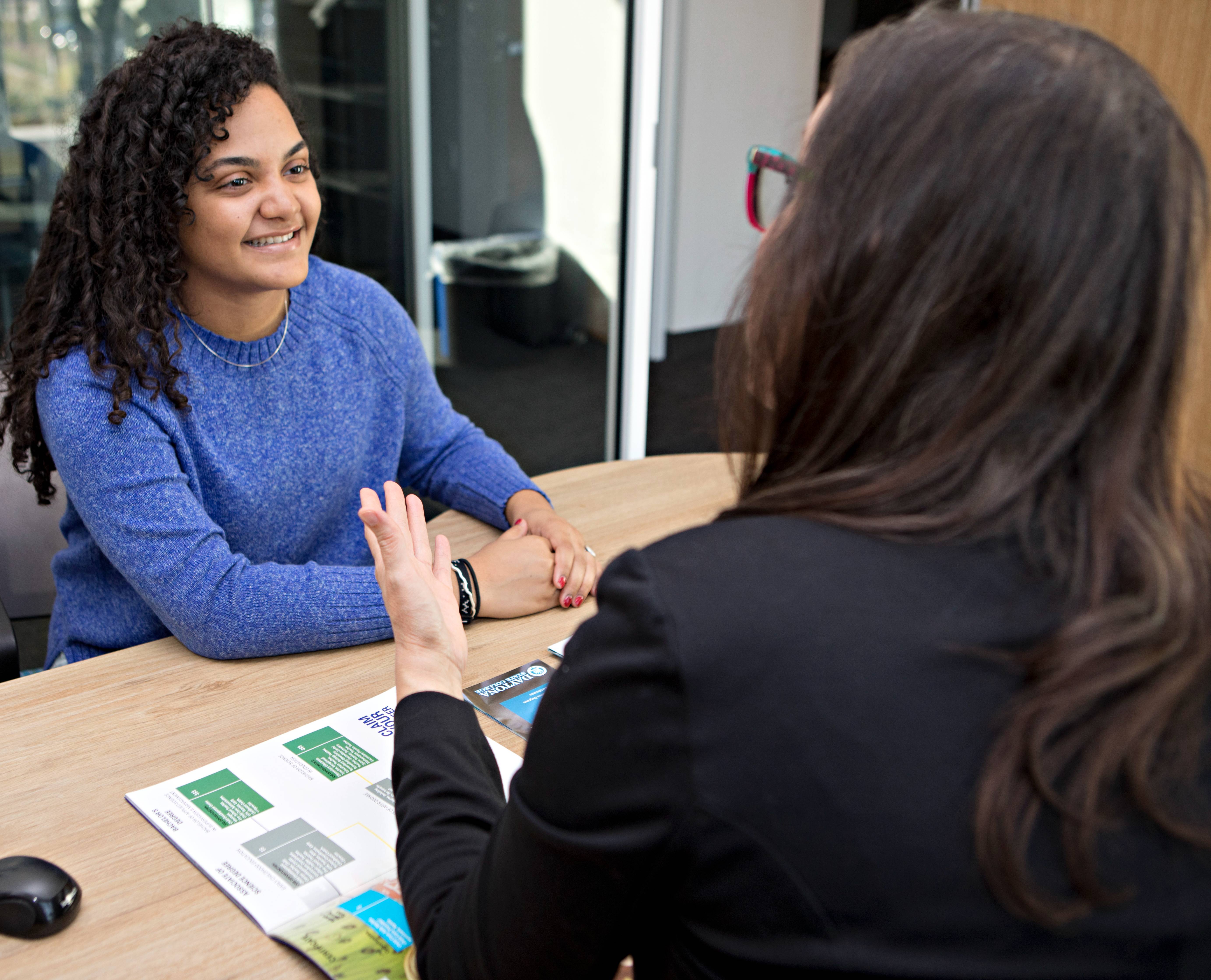 student and advisor in a career advising session