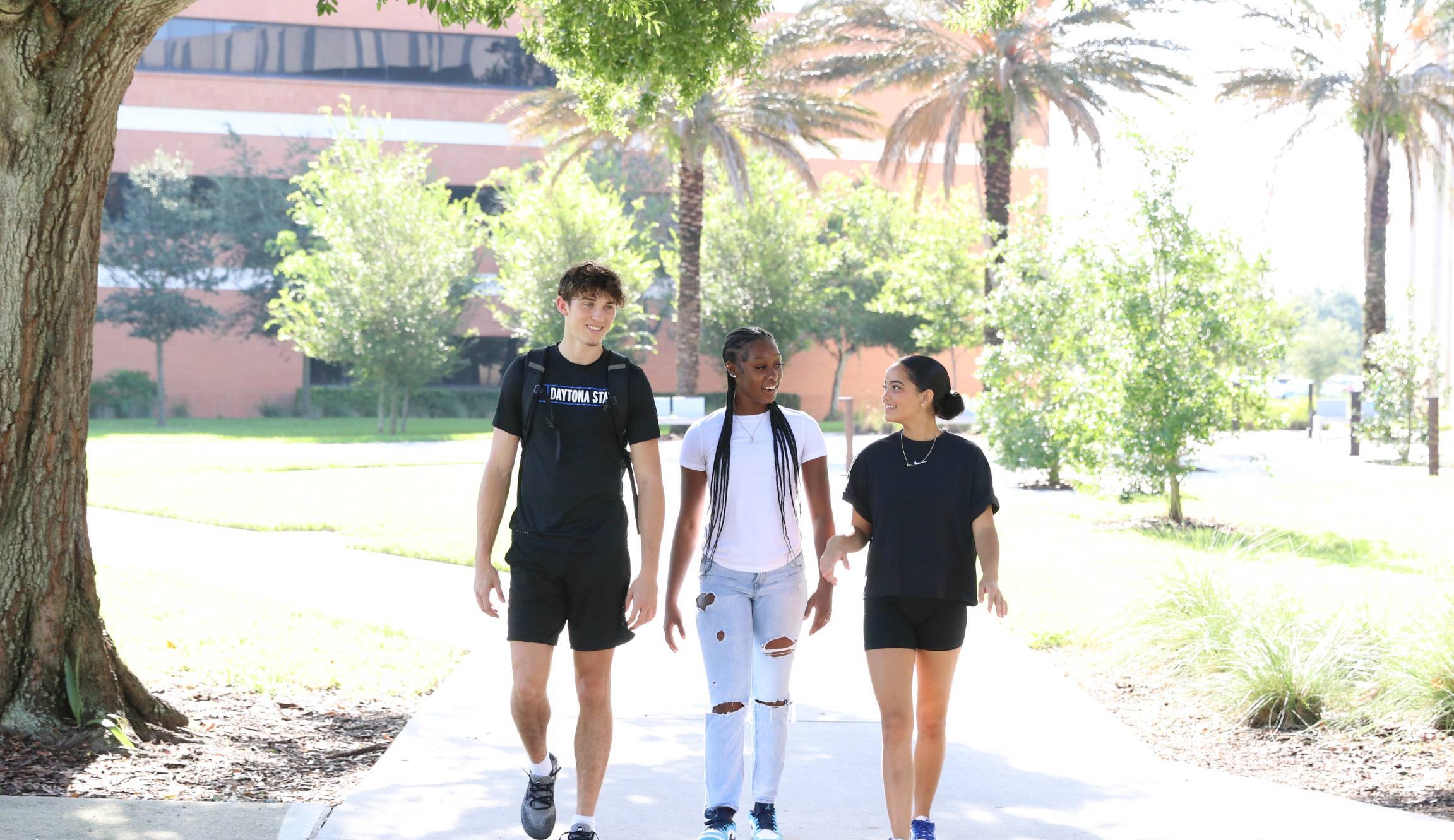 six students standing together