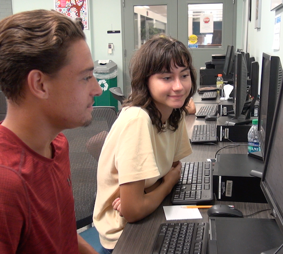 two students working in a computer lab