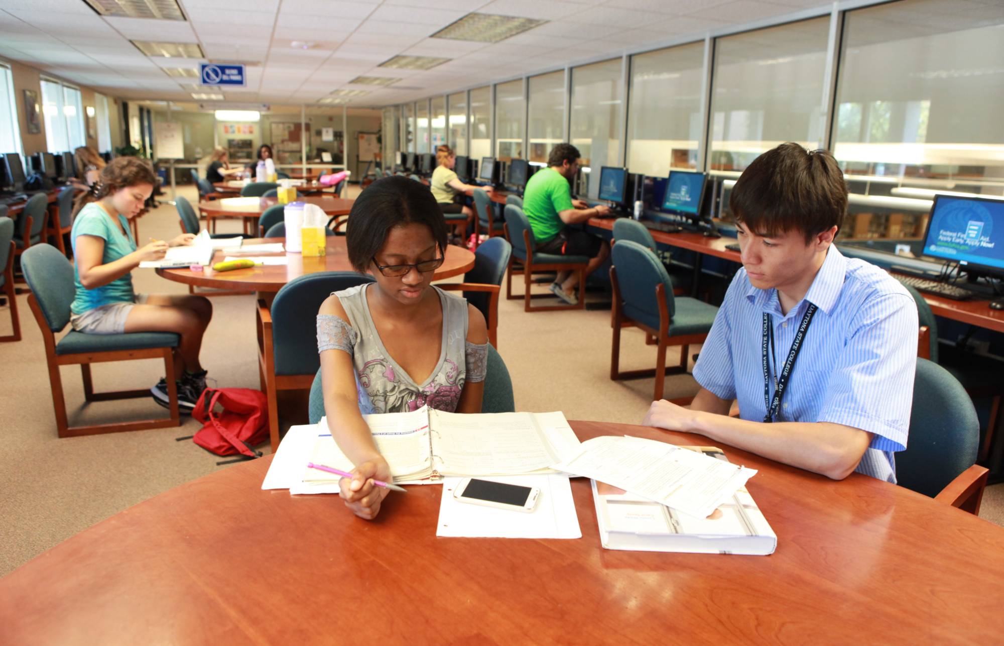 student working with a tutor