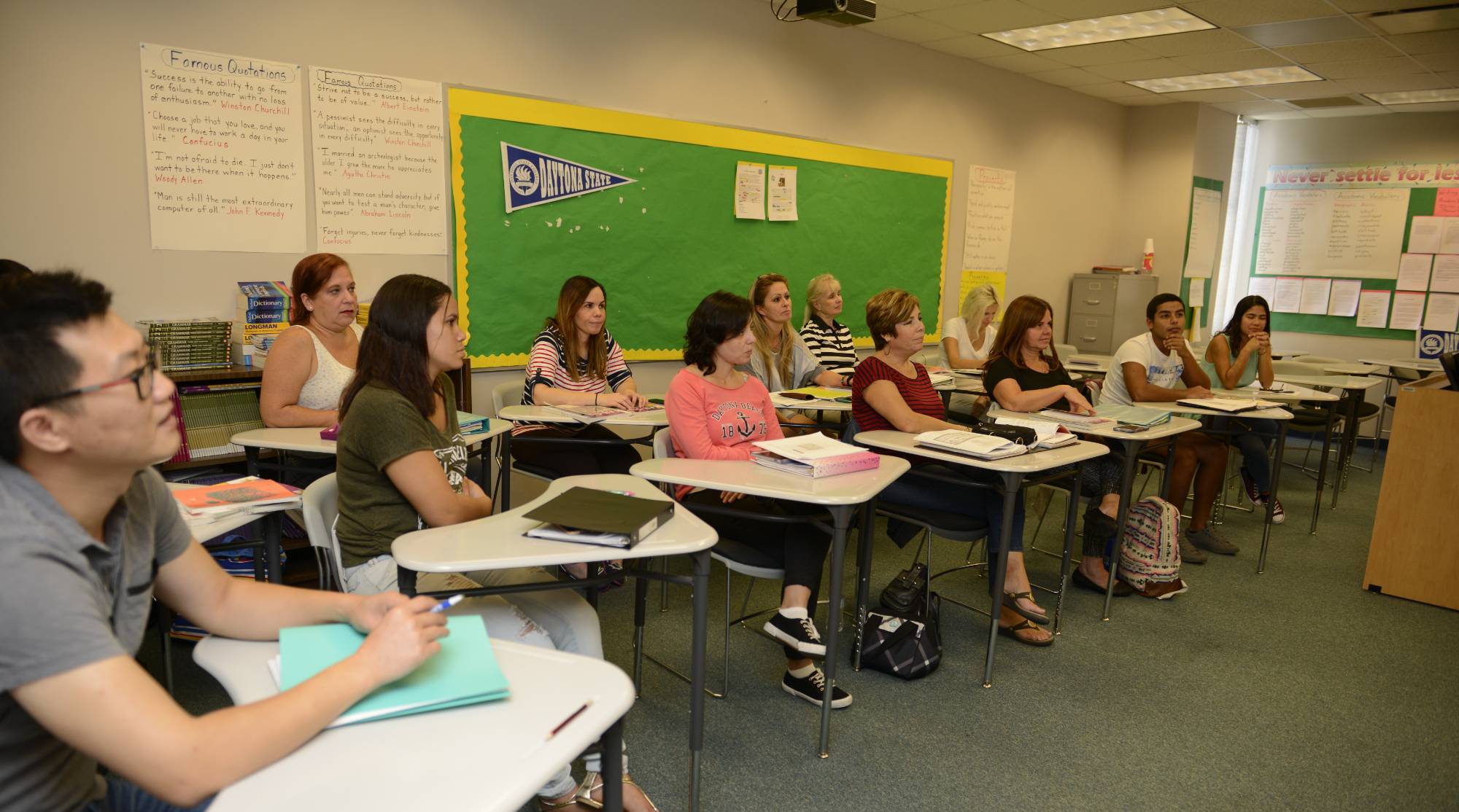 students sitting at desks in a classroom