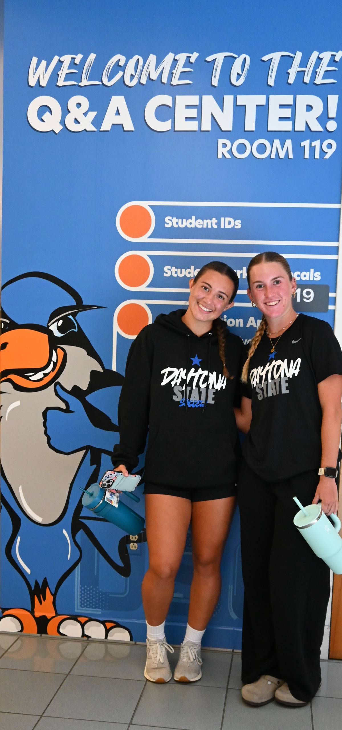 Two students moving into the on-campus residence hall. 