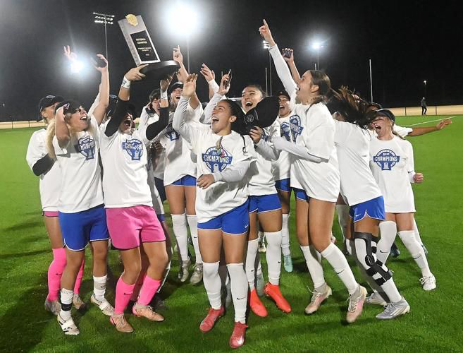 The Women's Soccer team celebrating their back to back national championship win. 