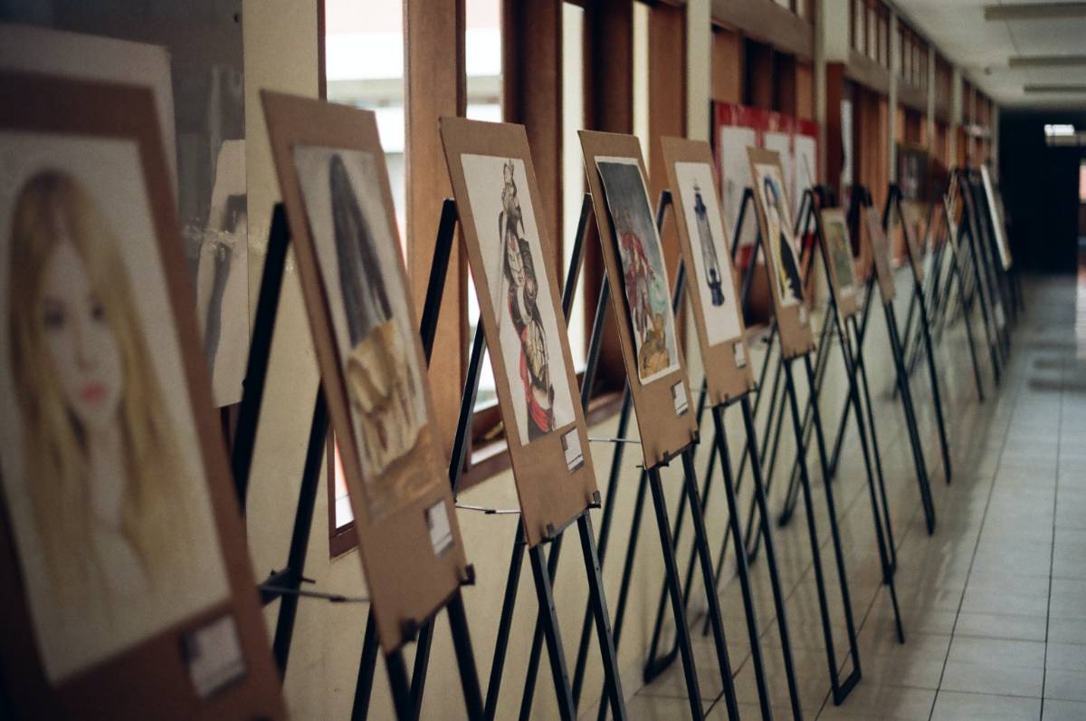 art displayed on easels