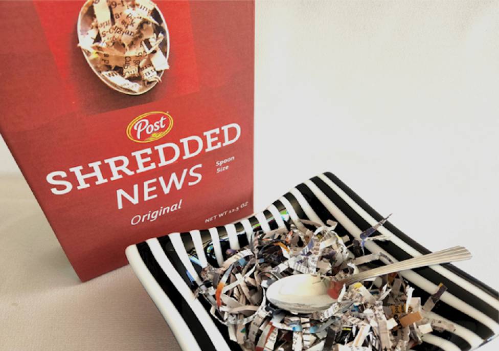 Shredded News cereal box with shredded newspaper in black and white striped cereal bowl