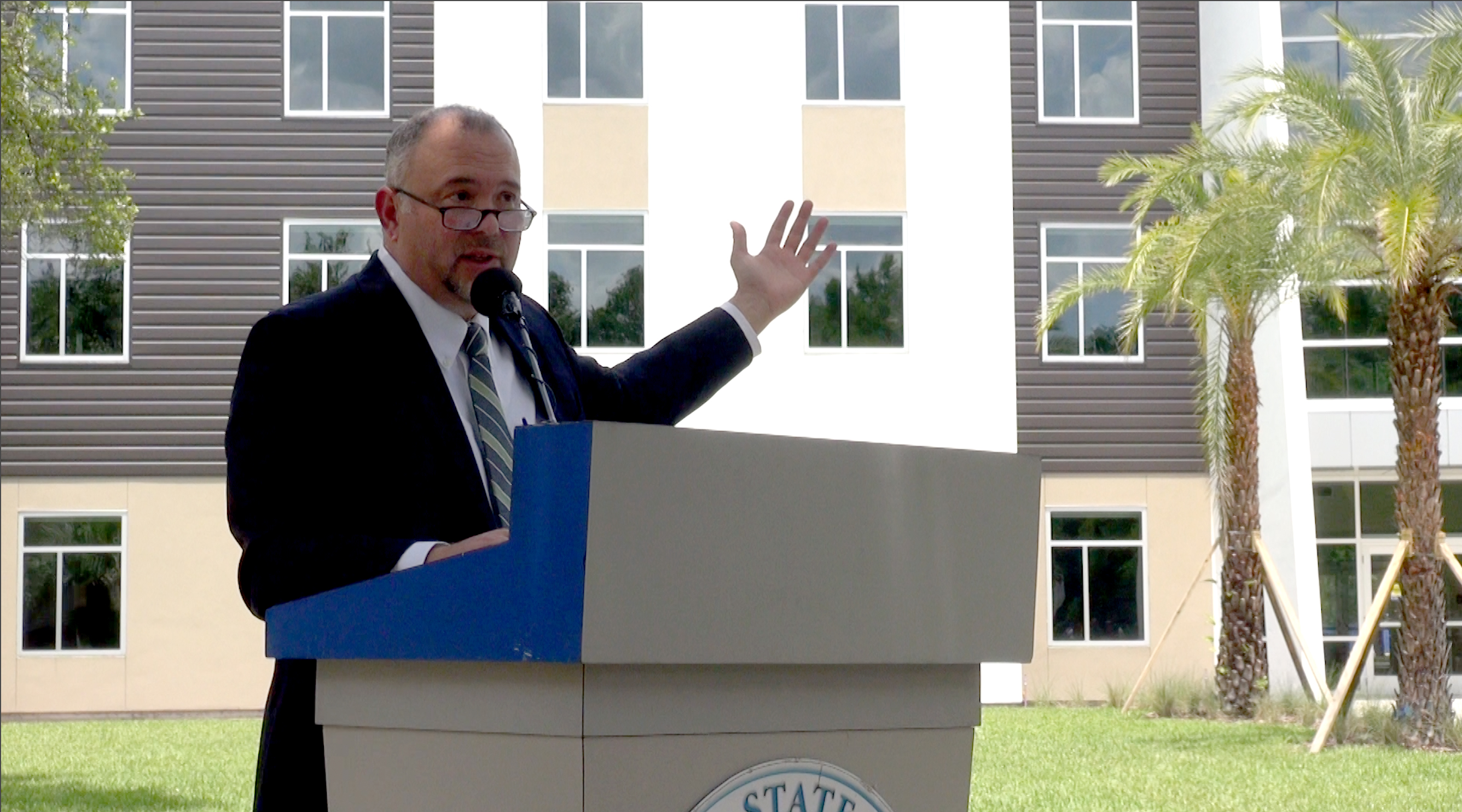 Dr. Tom LoBasso officially opens the new residence hall. 