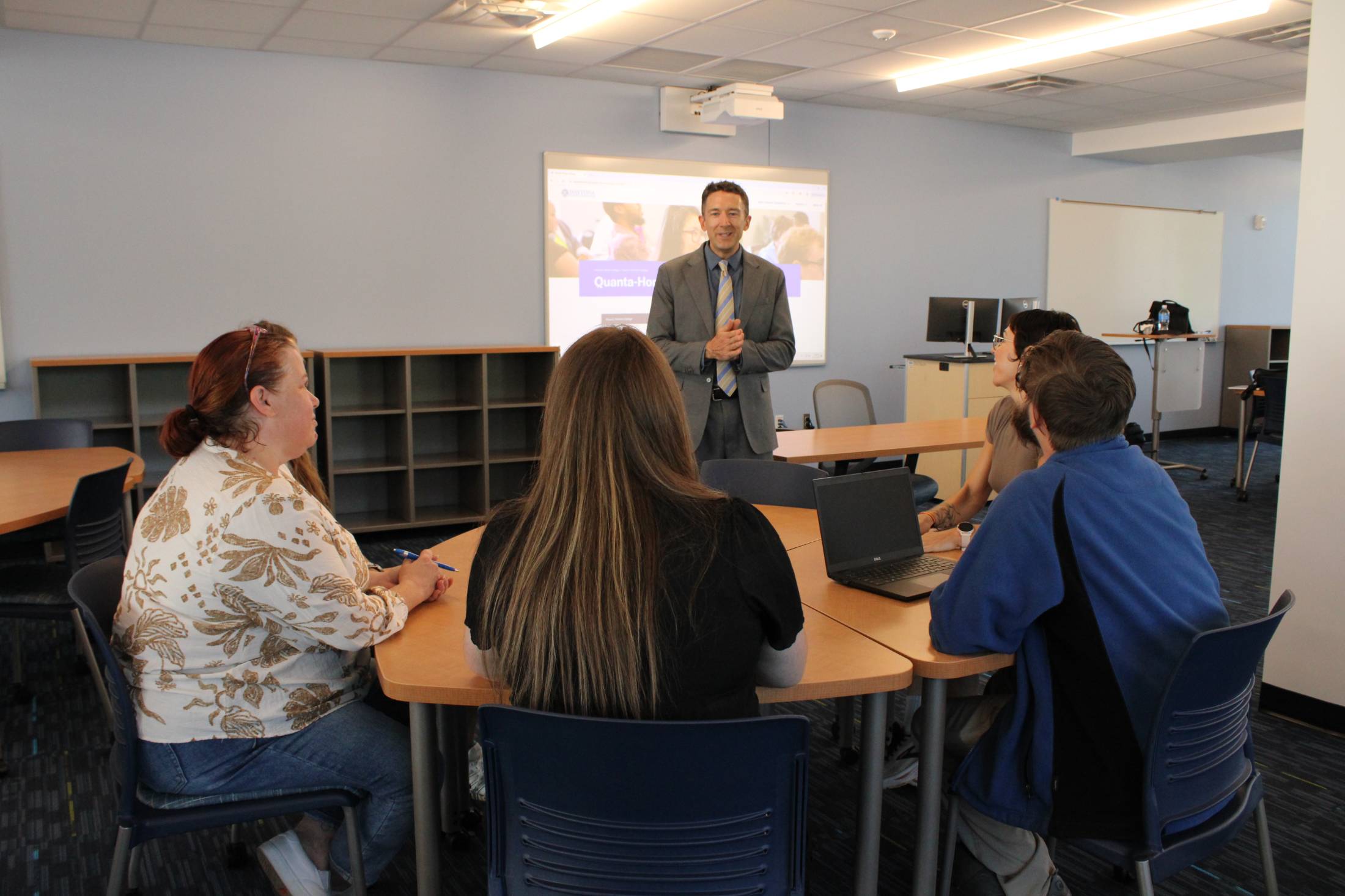 Dr. Ben Graydon and Quanta-Honors College students in their new classroom. 