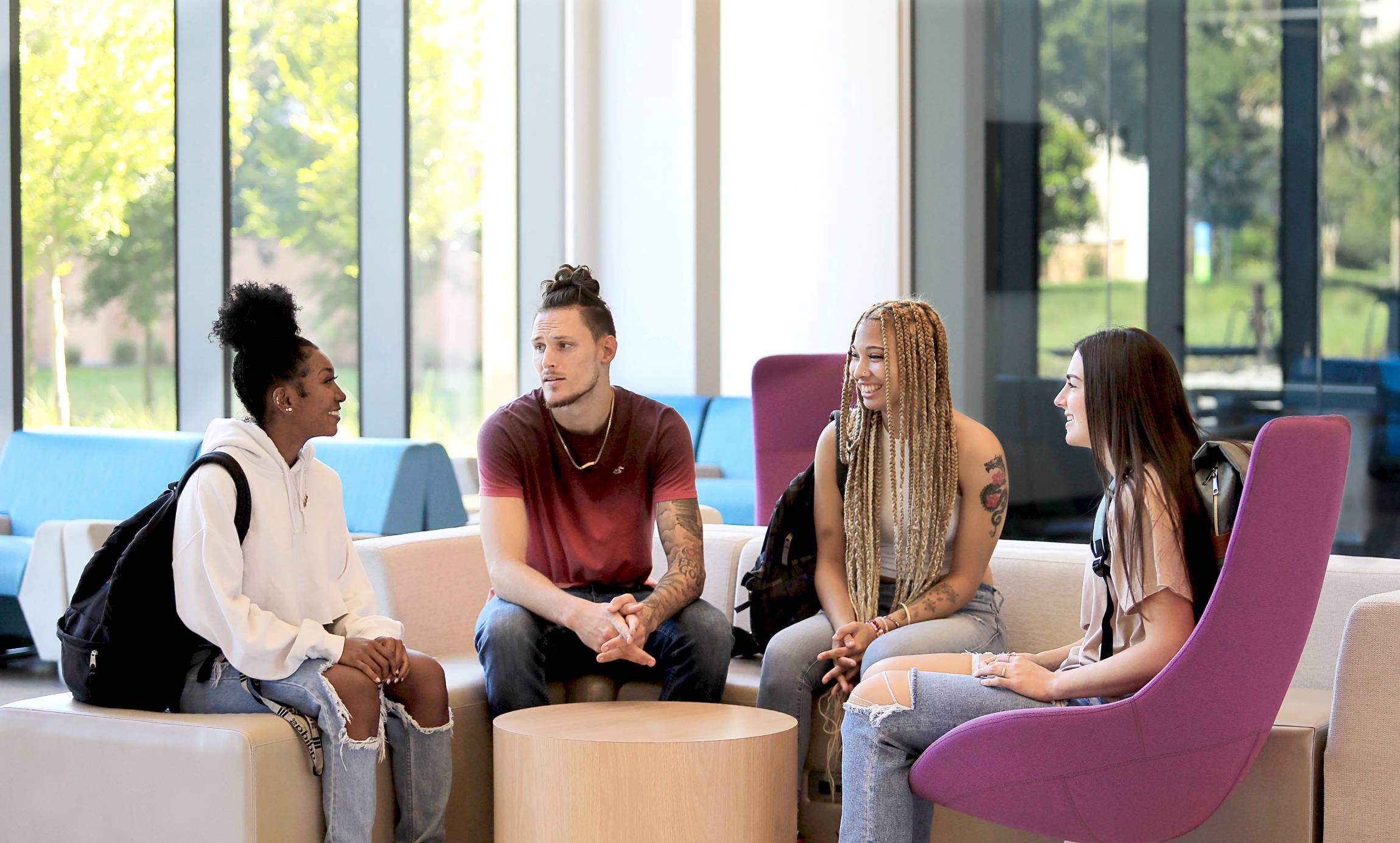 A group of students hanging out in the Student Center. 