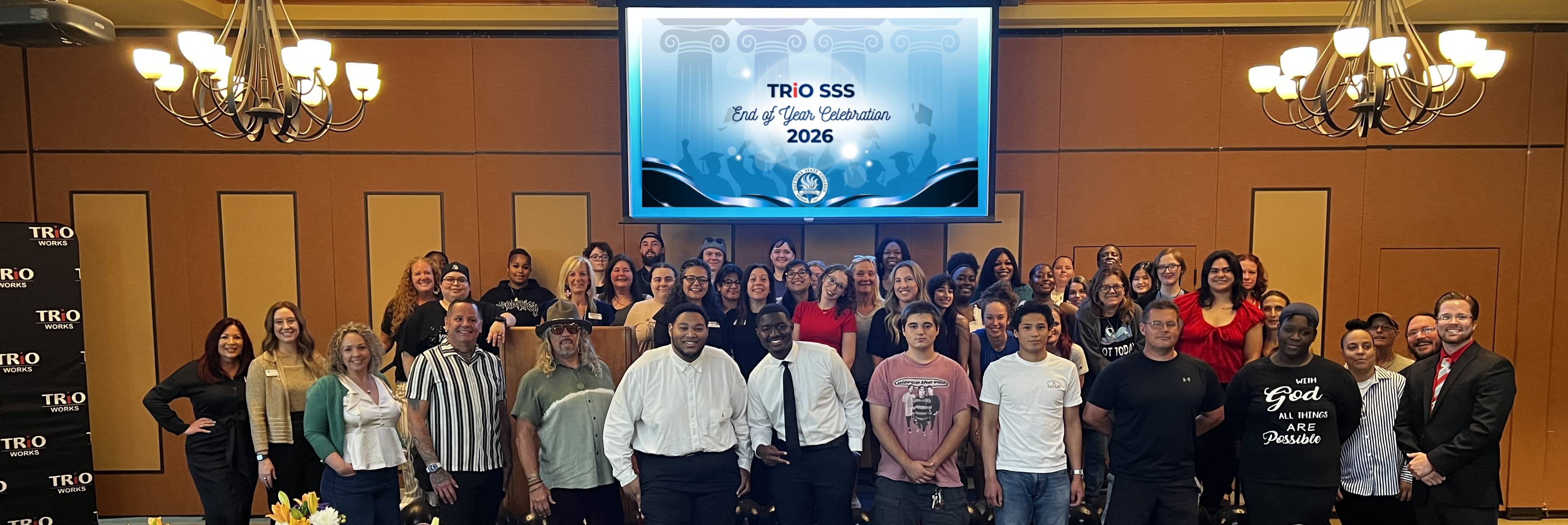 Trio celebration group photo