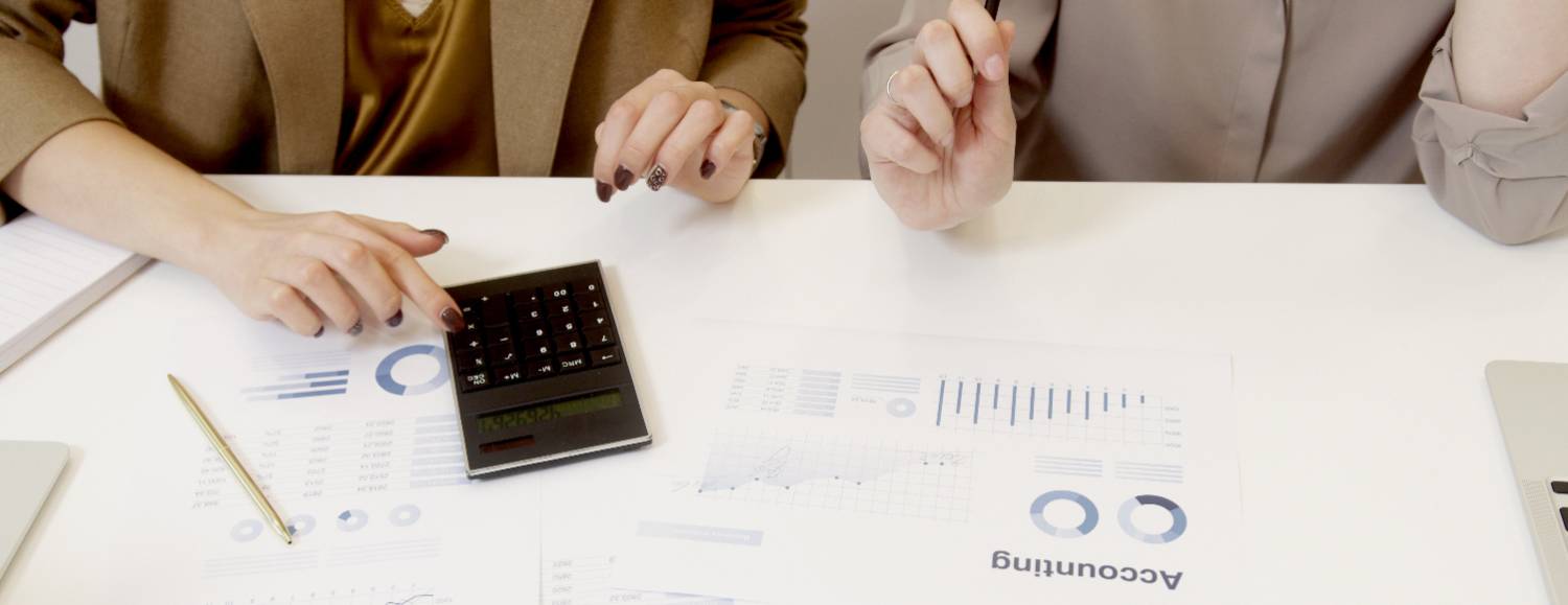 two people reviewing accounting documents