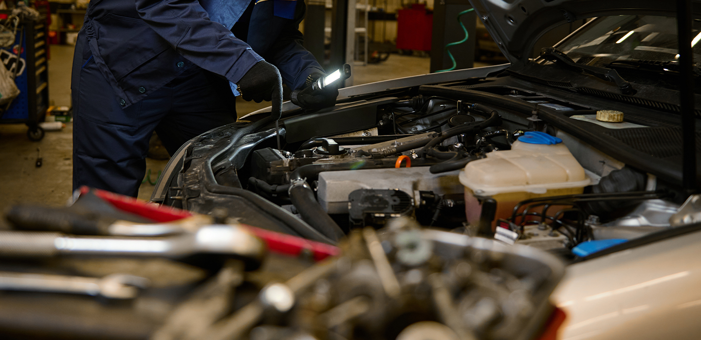 Man working on car