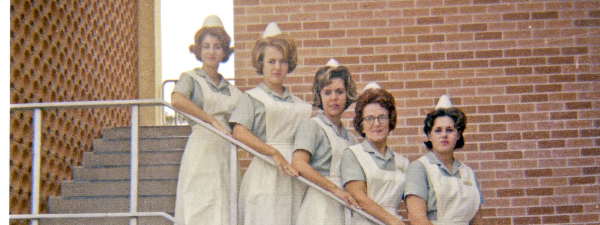Sandi Petker and other nursing students on stairs