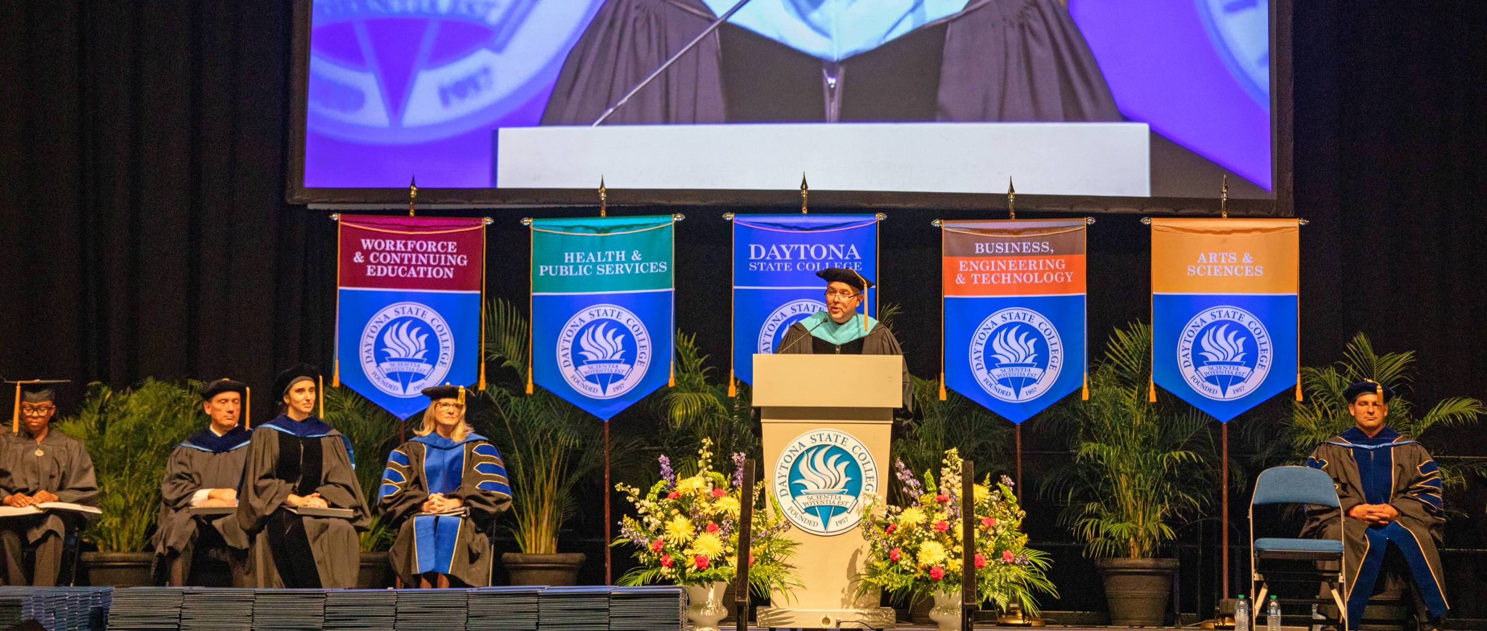 Dr. LoBasso speaking to the graduates at the DSC commencement ceremony.