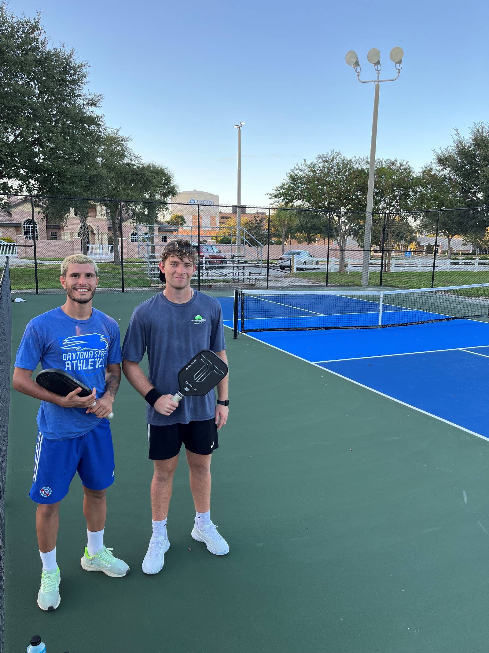 Students playing on the new pickleball courts on campus.